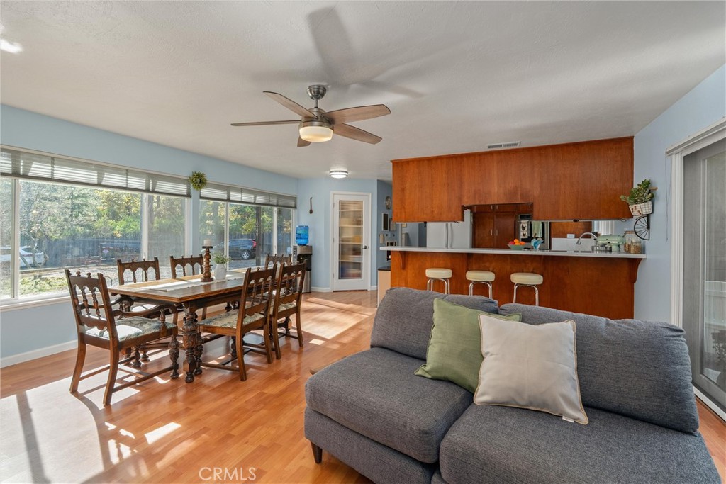 16298 Forest Ranch Road Forest Ranch, CA 95942 - Photo 26 of 67 a dining room with furniture window and wooden floor