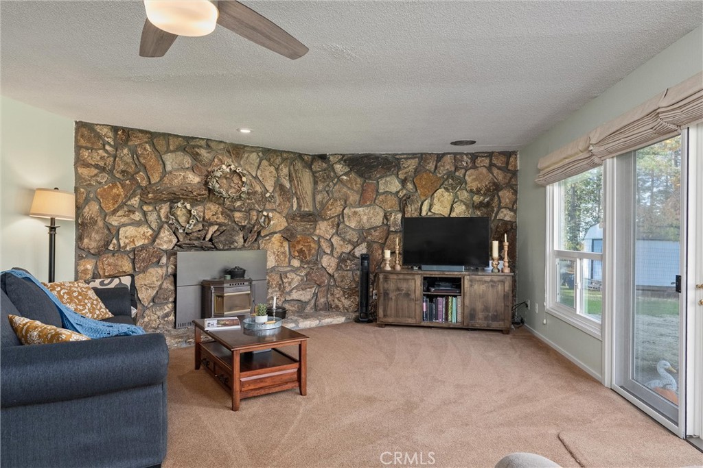16298 Forest Ranch Road Forest Ranch, CA 95942 - Photo 3 of 67 a living room with furniture and a flat screen tv