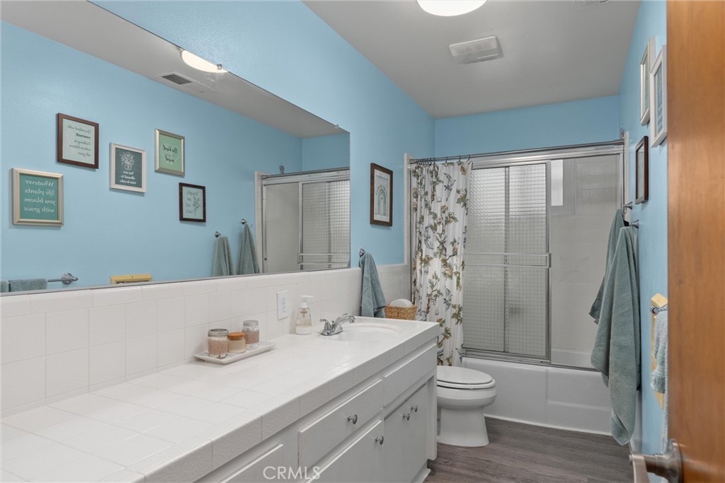 16298 Forest Ranch Road Forest Ranch, CA 95942 - Photo 34 of 67 a bathroom with a sink a toilet and shower