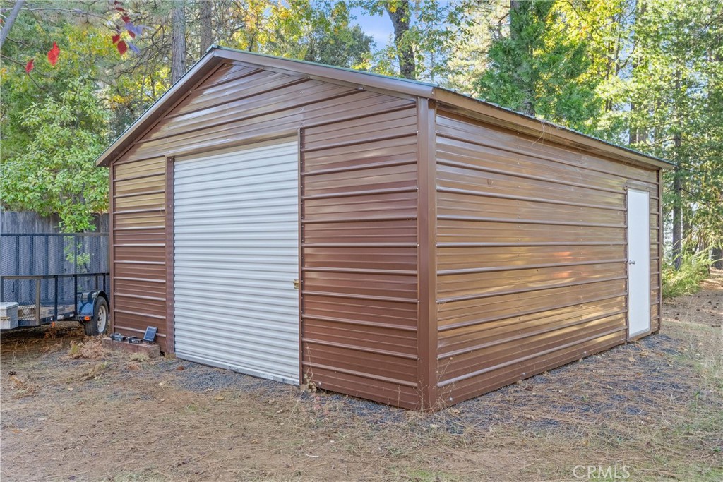 16298 Forest Ranch Road Forest Ranch, CA 95942 - Photo 50 of 67 a view of a small house and a yard