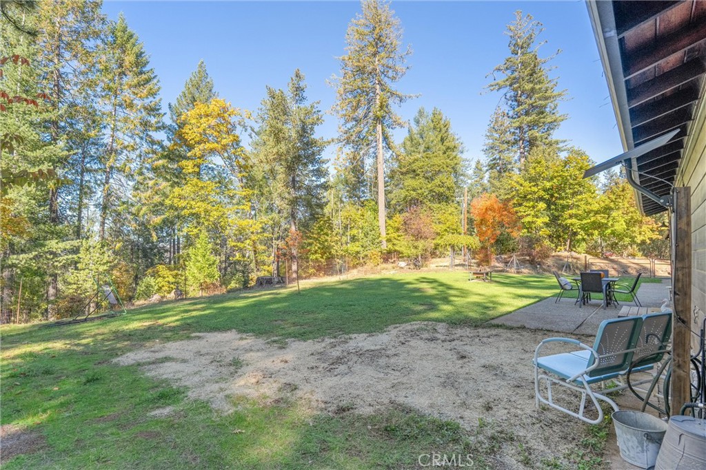 16298 Forest Ranch Road Forest Ranch, CA 95942 - Photo 54 of 67 a view of backyard with seating area and trees