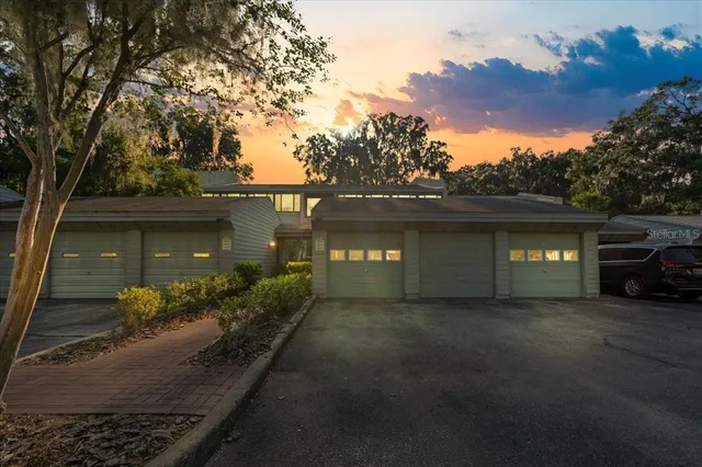 an outdoor view of house with lake view