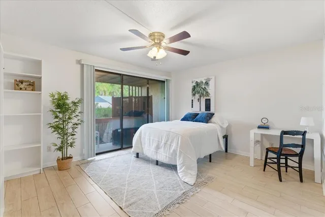a large white bed in a white room