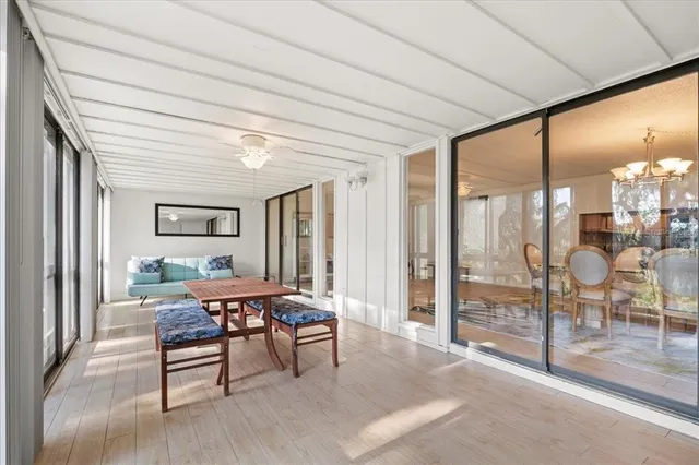 a view of a bathroom from a hallway