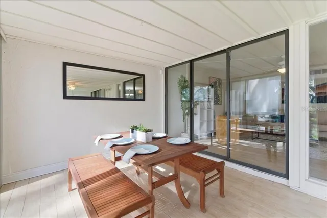 a view of a patio with couches table and chairs