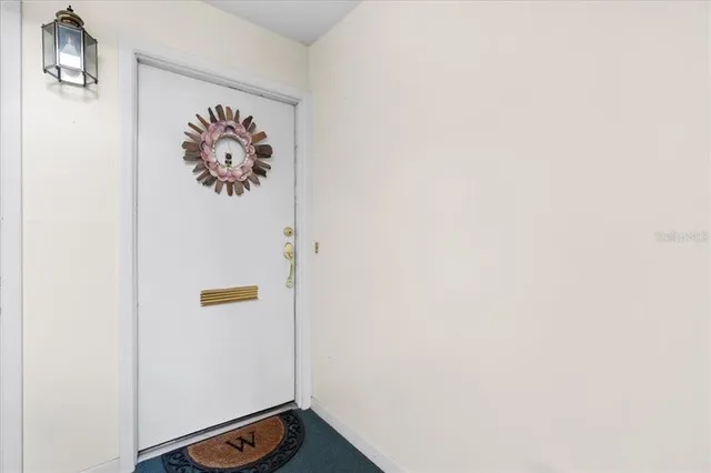 a view of a hallway with workspace