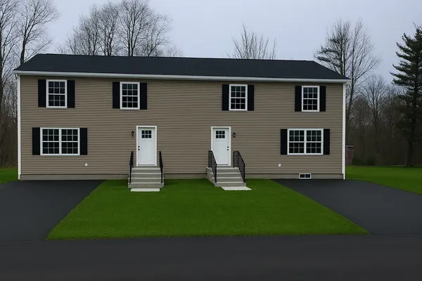 a front view of a house with a yard