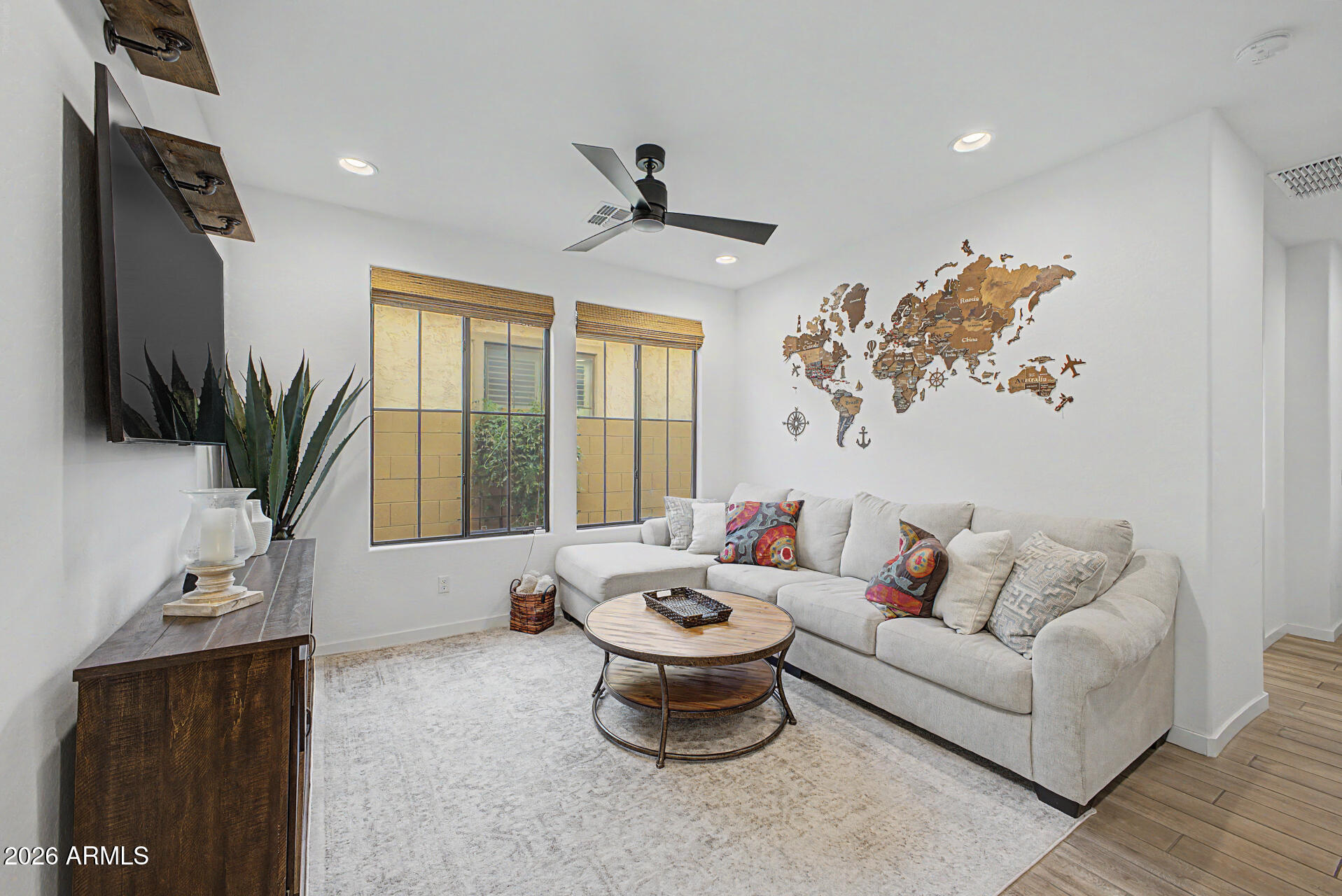 819 West Deer Creek Road Phoenix, AZ 85048 - Photo 15 of 76 a living room with furniture and a large window