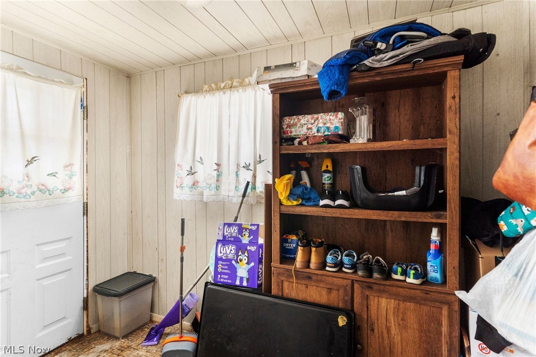 464 Elm Street Struthers, OH 44471 - Photo 11 of 22 Detailed view of wooden walls and wood ceiling