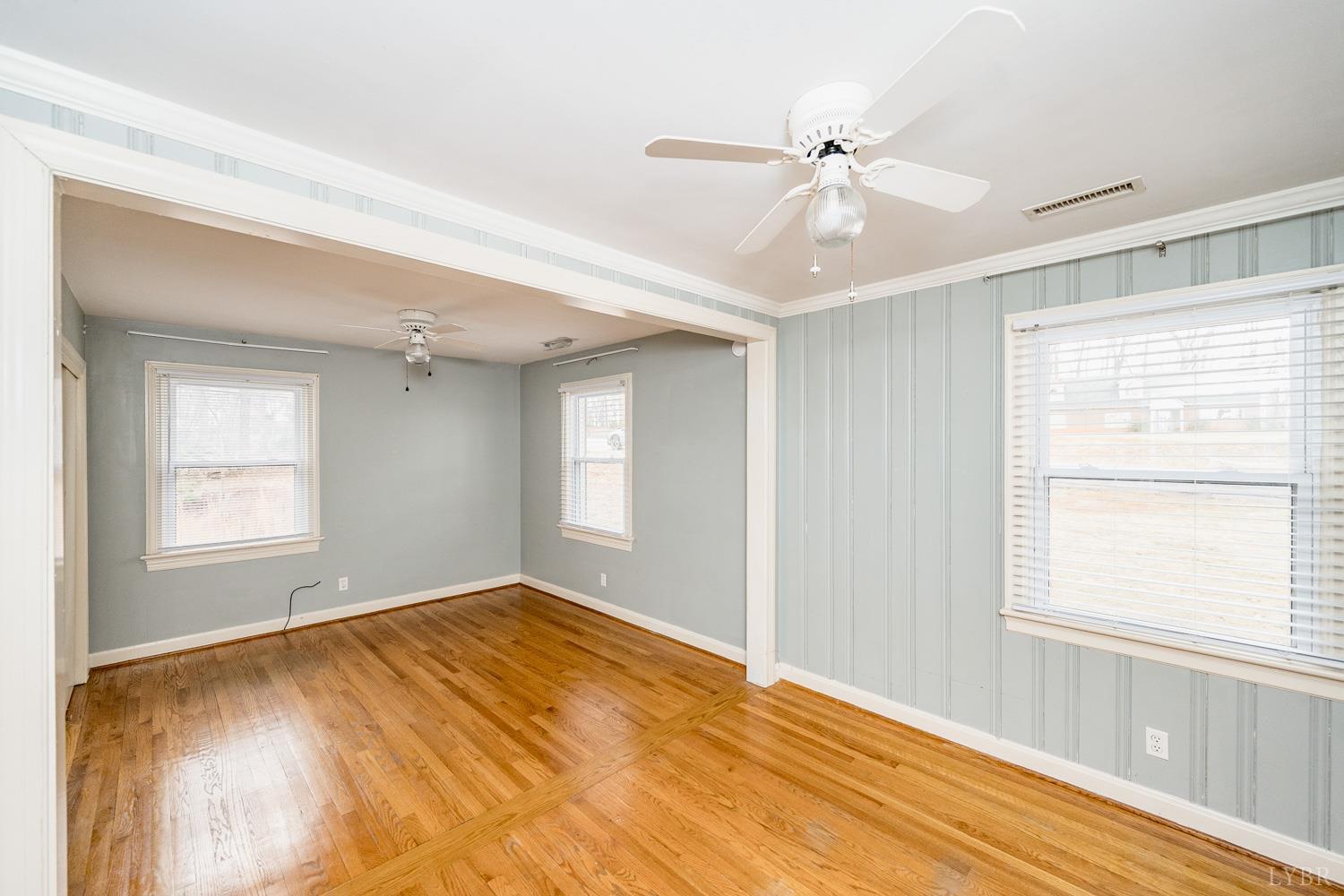 4925 Old Boonsboro Road Lynchburg, VA 24503 - Photo 23 of 57 a view of empty room with wooden floor and fan