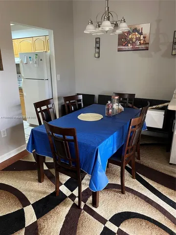 a view of a workspace with furniture