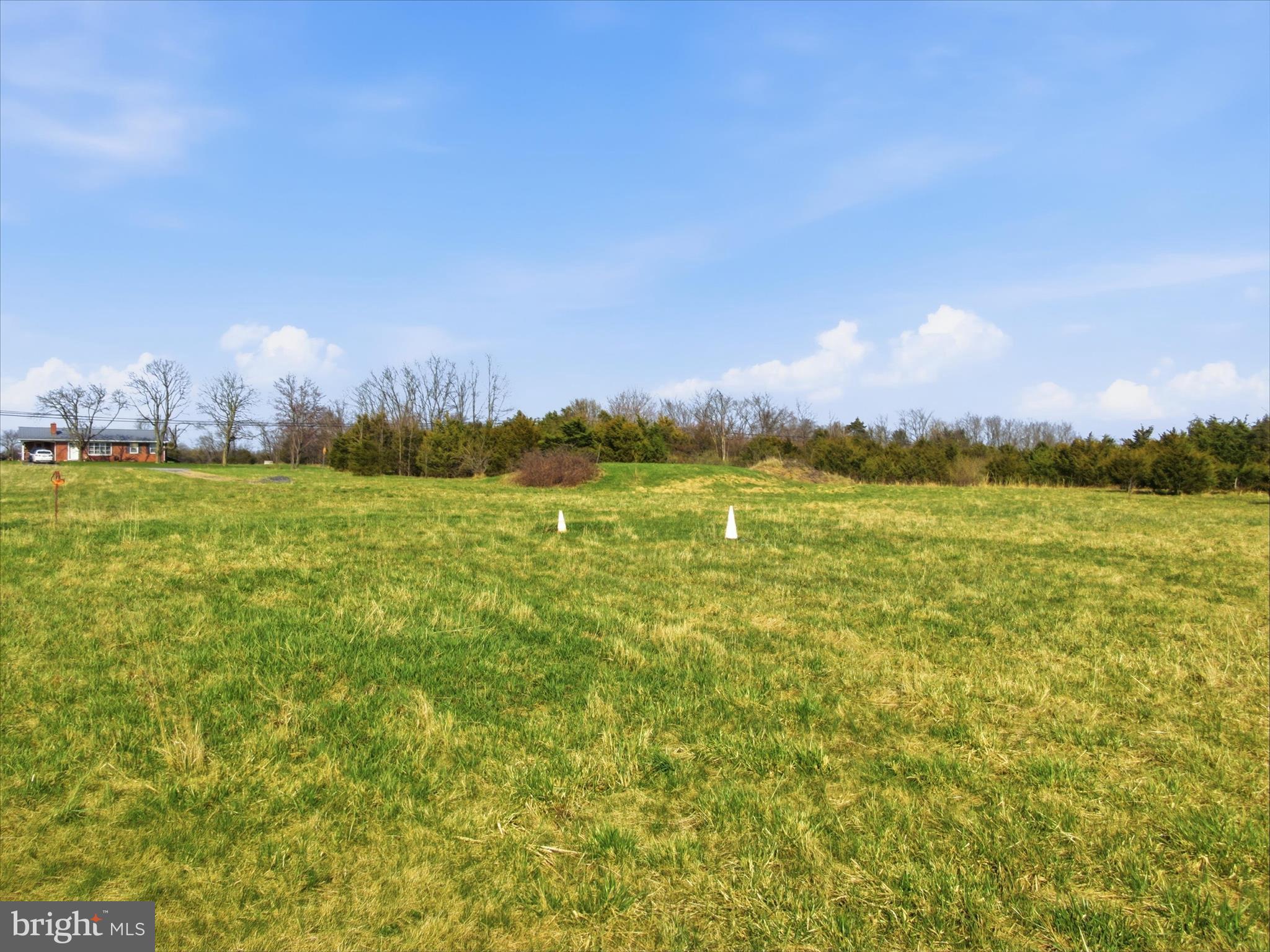 10593 Letzburg Road Greencastle, PA 17225 - Photo 3 of 21 a view of a lake with houses in the background