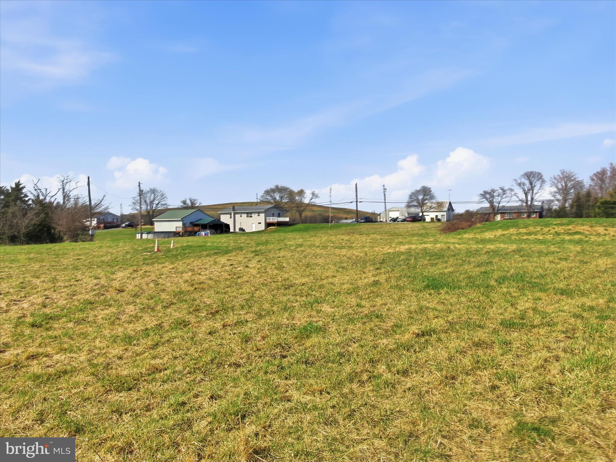 10593 Letzburg Road Greencastle, PA 17225 - Photo 4 of 21 a view of a lake with houses in the background
