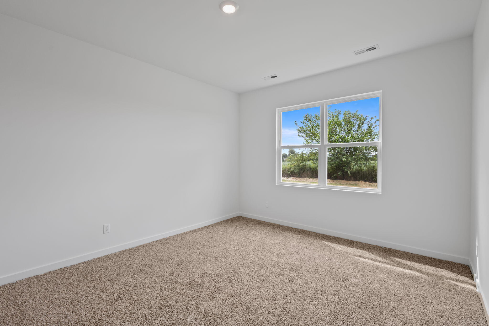 7293 West 107th Place Crown Point, IN 46307 - Photo 13 of 24 an empty room with a window