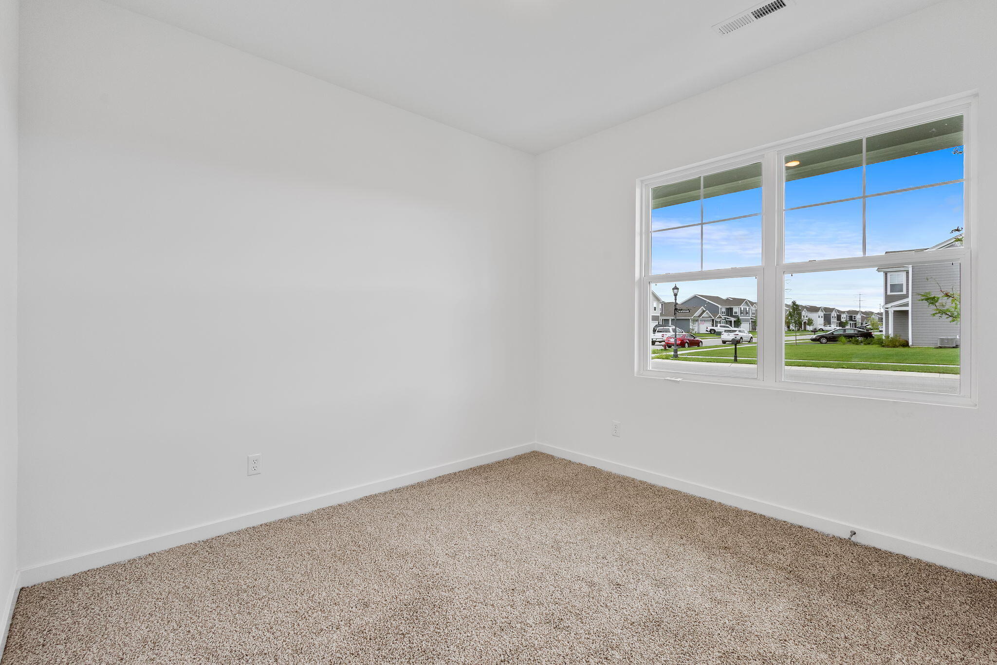 7293 West 107th Place Crown Point, IN 46307 - Photo 19 of 24 a view of an empty room with a window