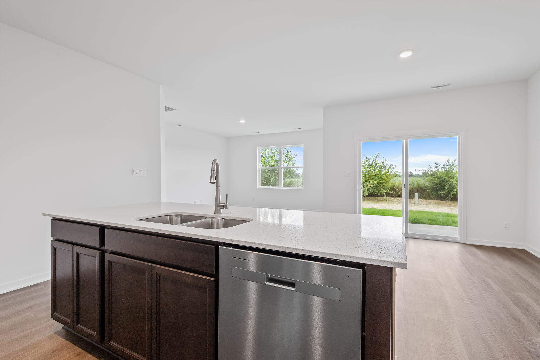 7293 West 107th Place Crown Point, IN 46307 - Photo 6 of 24 a kitchen with a sink and large window
