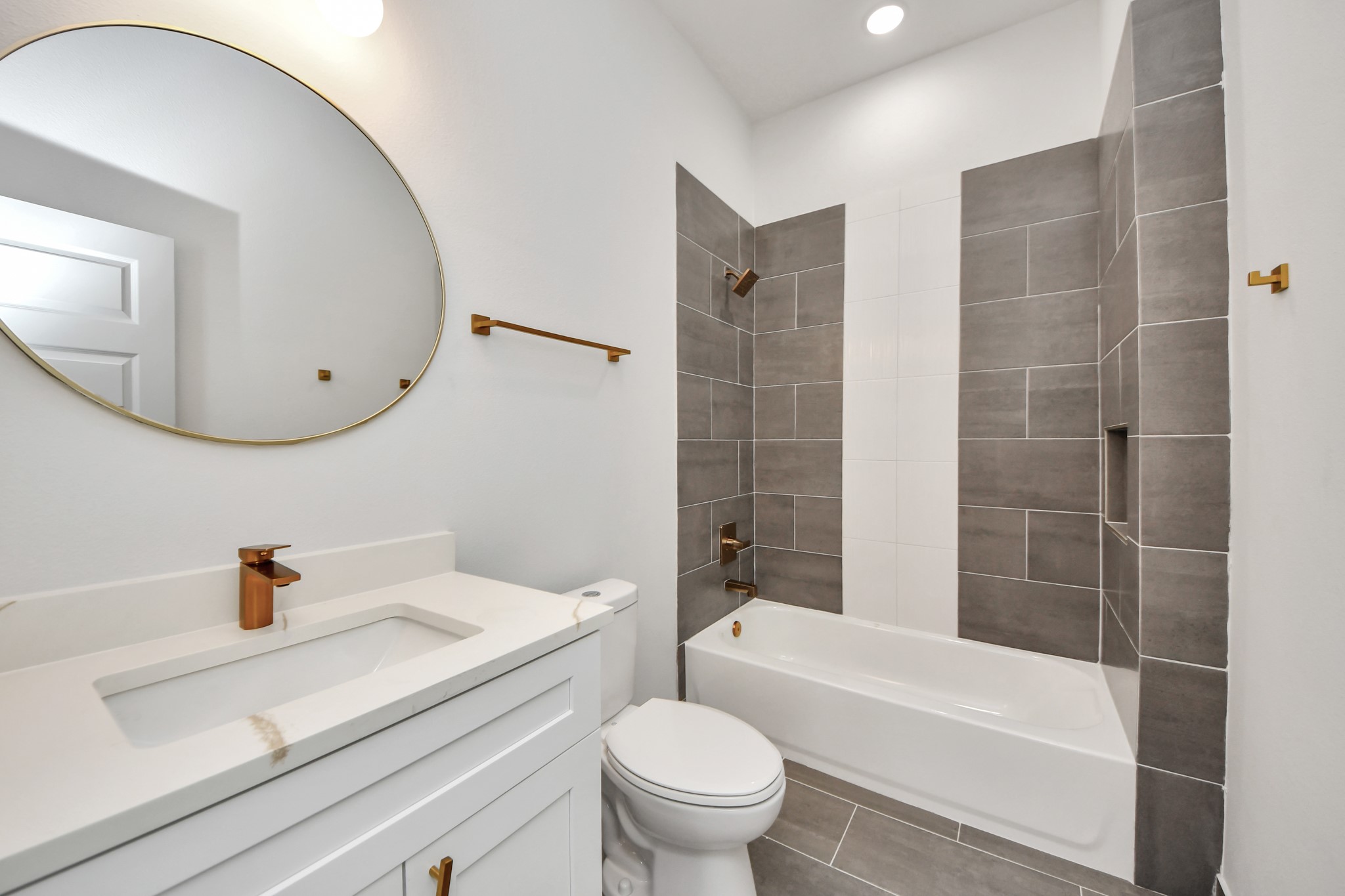 8114 Double Avenue, Unit B Houston, TX 77088 - Photo 18 of 34 a bathroom with a sink a toilet and shower
