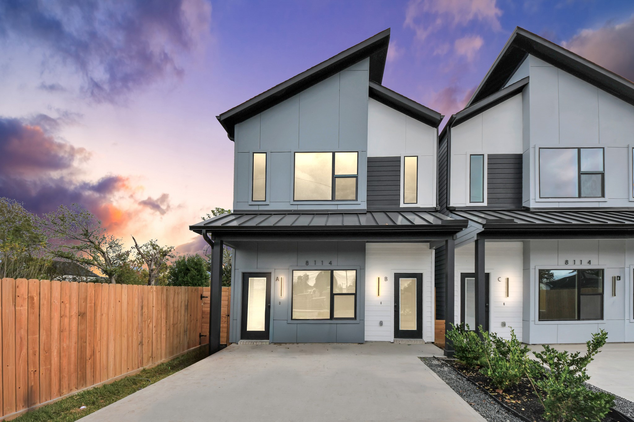 8114 Double Avenue, Unit B Houston, TX 77088 - Photo 4 of 34 a front view of a house with a garden