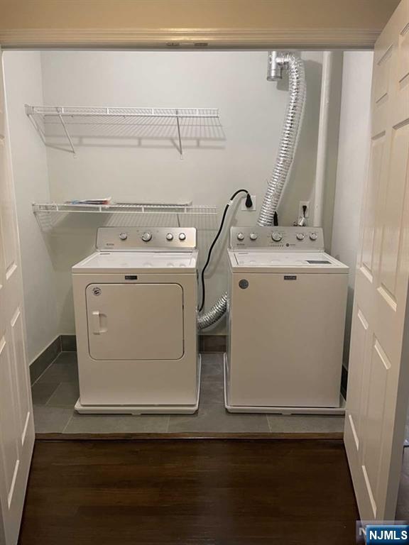 280-320 Oak Street, Unit 314 TI Ridgewood, NJ 07450 - Photo 2 of 15 a utility room with dryer and washer