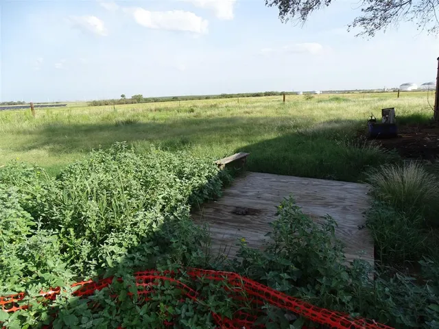 a view of an outdoor space with a lake view