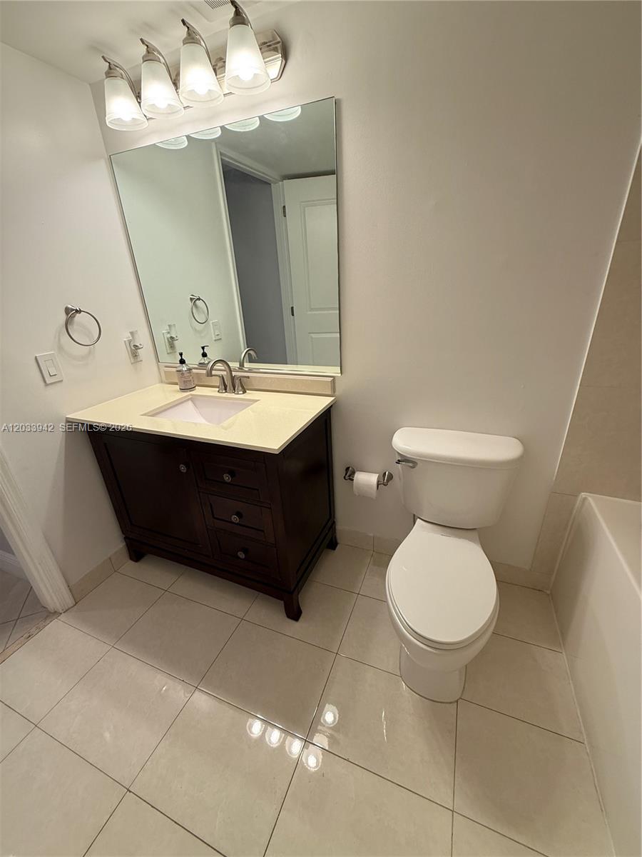 480 Northeast 30th Street, Unit 1504 Miami, FL 33137 - Photo 12 of 14 Primary bathroom in bedroom