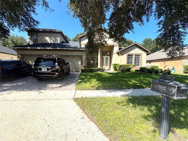 a car parked in front of a house