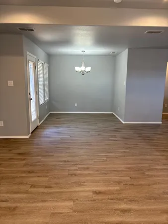 a view of an empty room and window