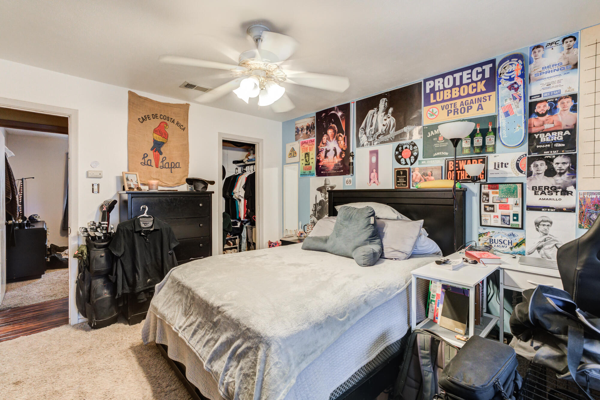 4802 53rd Street Lubbock, TX 79414 - Photo 22 of 31 a bedroom with a bed and furniture
