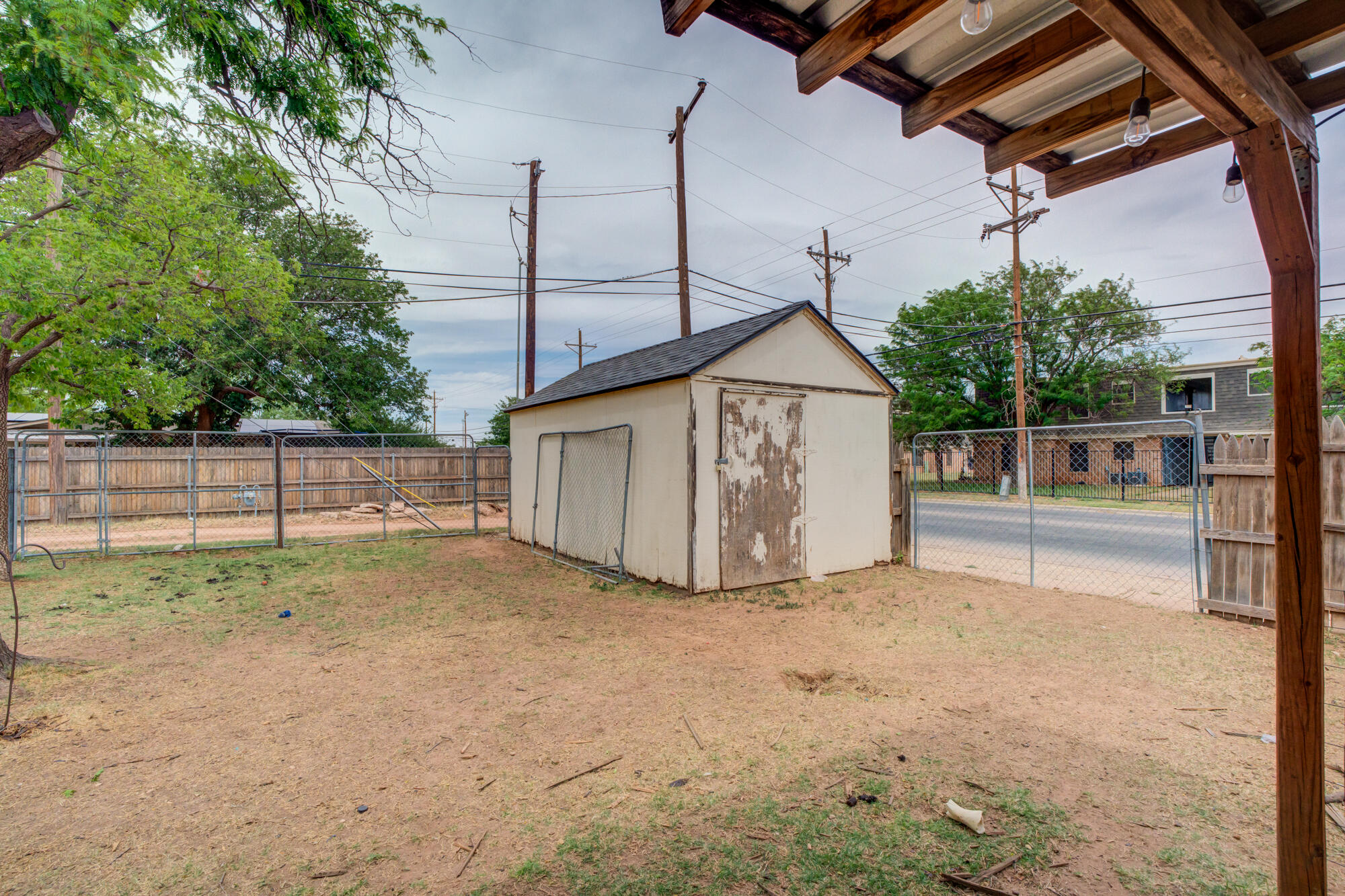4802 53rd Street Lubbock, TX 79414 - Photo 28 of 31 a view of a house with a fence