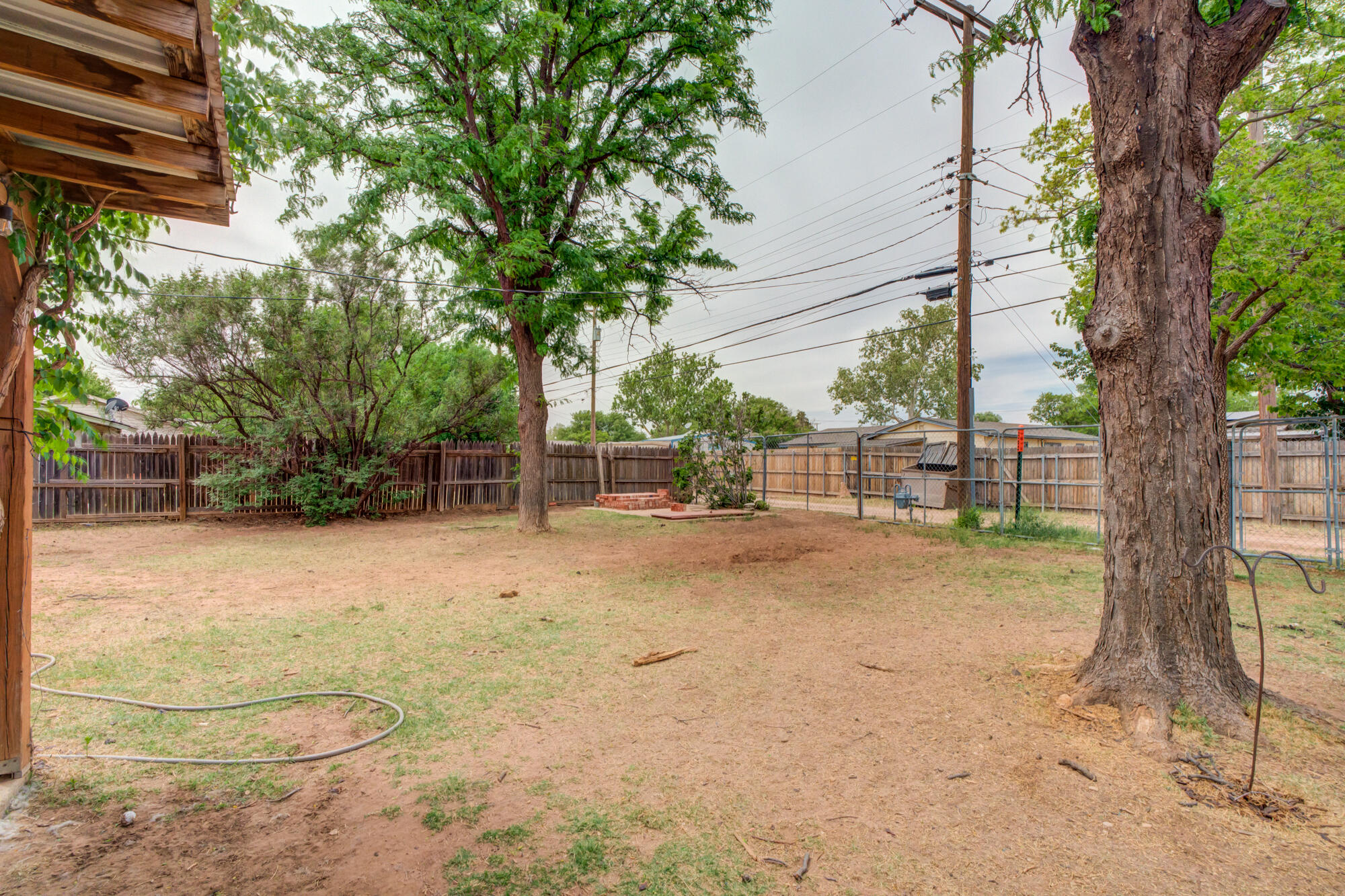 4802 53rd Street Lubbock, TX 79414 - Photo 29 of 31 a view of a yard with basketball court