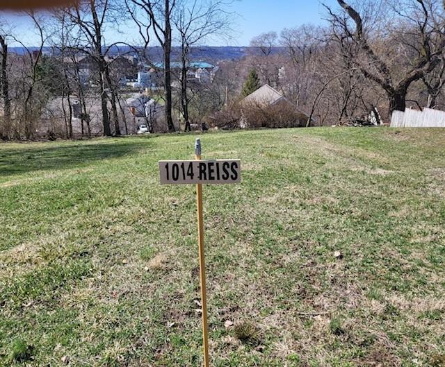 1014 Reiss Street Pittsburgh, PA 15212 - Photo 1 of 10 a sign board with tall trees