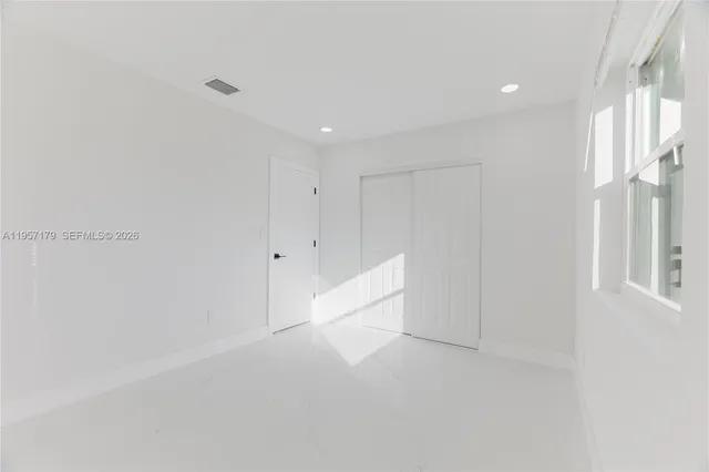an empty room with a window