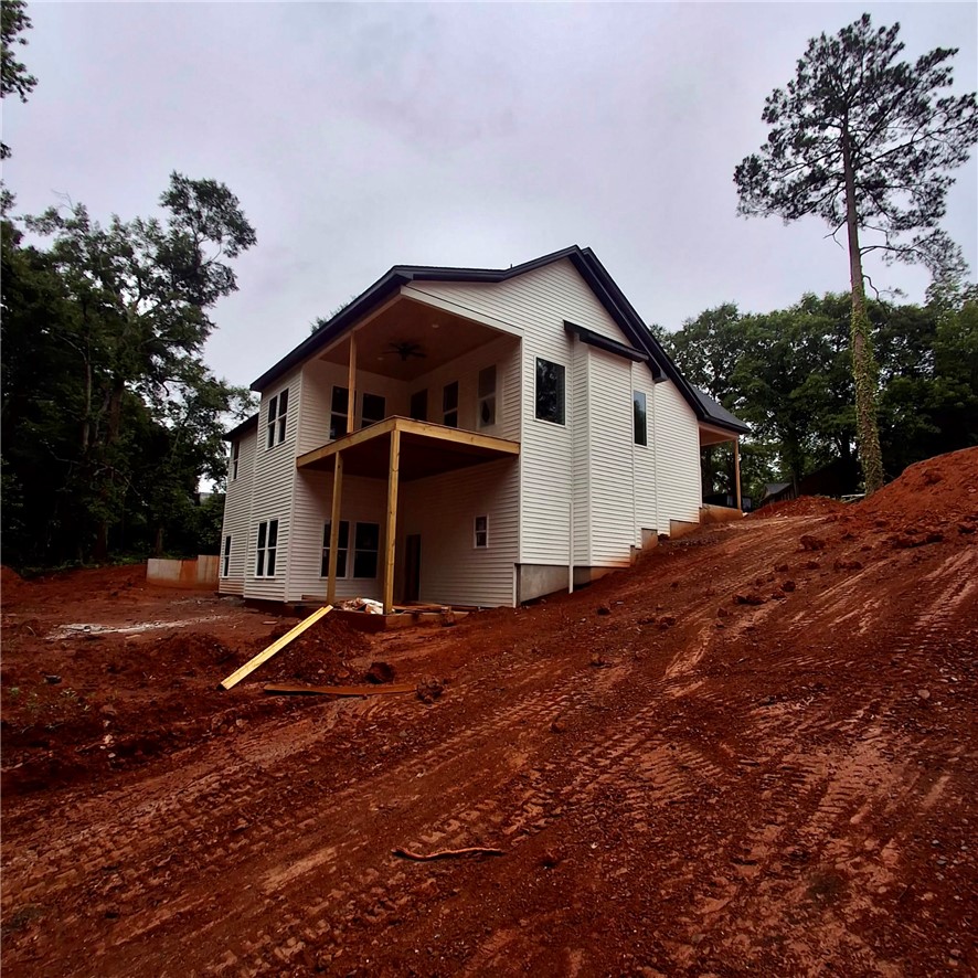 1411 Stonehurst Road Anderson, SC 29621 - Photo 3 of 3 A newly constructed residence features an inviting upper-level deck, perfect for outdoor relaxation.