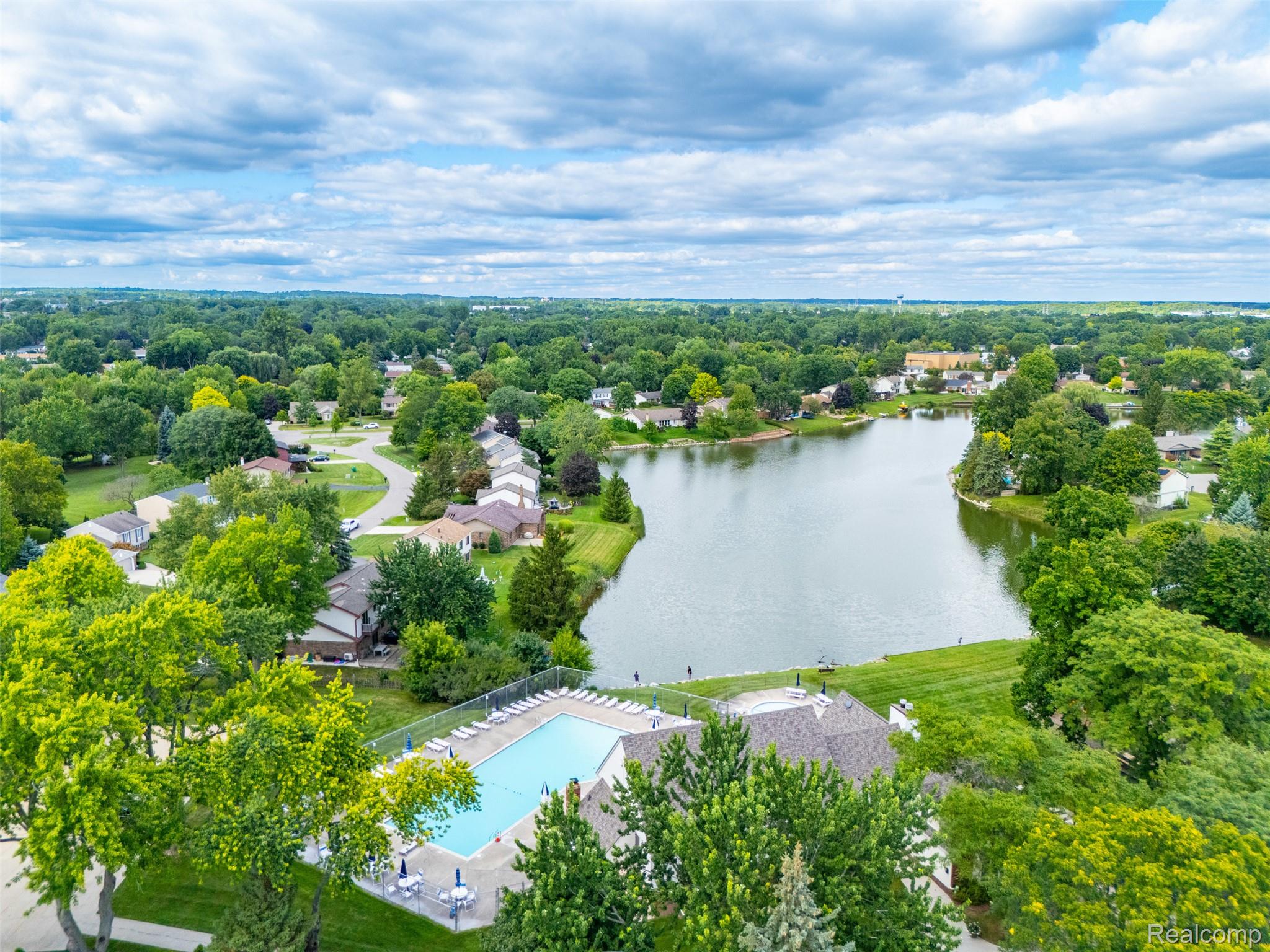 22530 Sheridan Road Novi, MI 48375 - Photo 45 of 50 Aerial perspective of suburban area with a large body of water and a pool