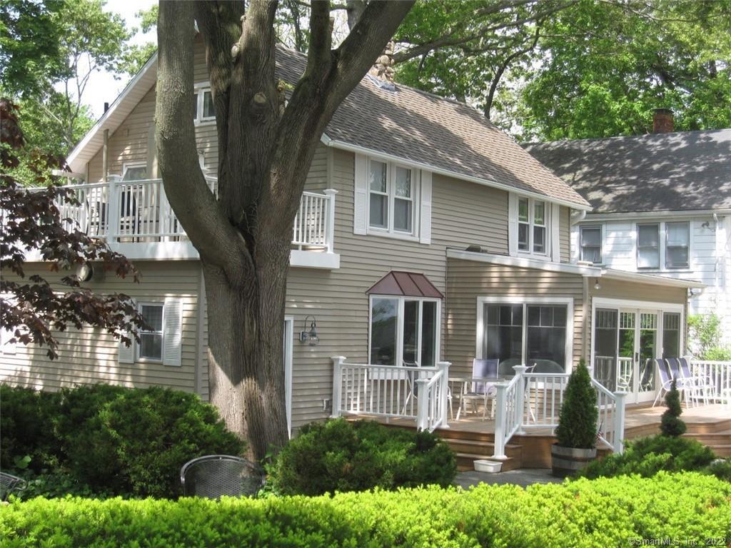 126 Grove Beach Road South Westbrook, CT 06498 - Photo 1 of 1 a front view of a house with a yard