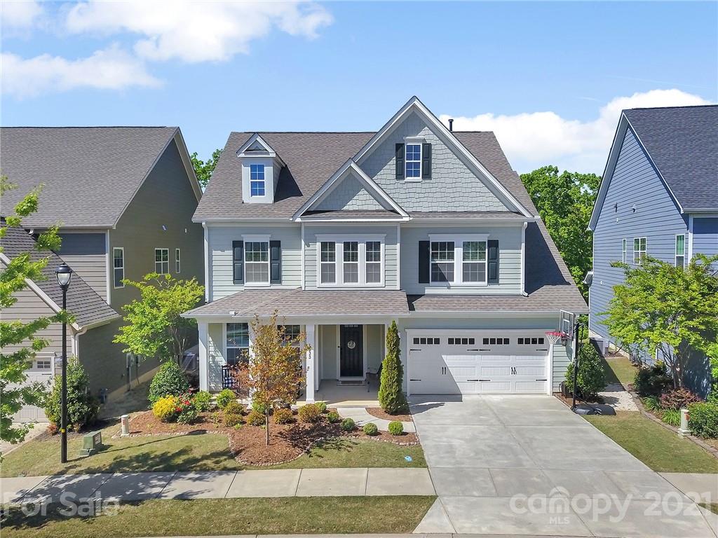 1033 Emory Lane Fort Mill, SC 29708 - Photo 1 of 48 a front view of a house with a yard