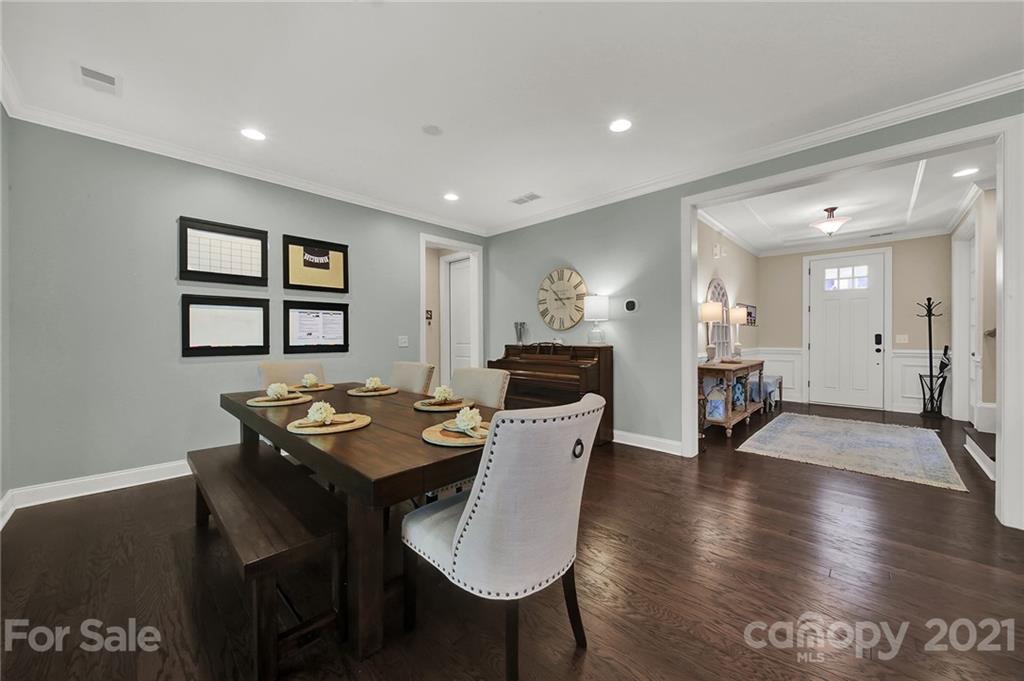 1033 Emory Lane Fort Mill, SC 29708 - Photo 18 of 48 a view of a dining room with furniture window and wooden floor