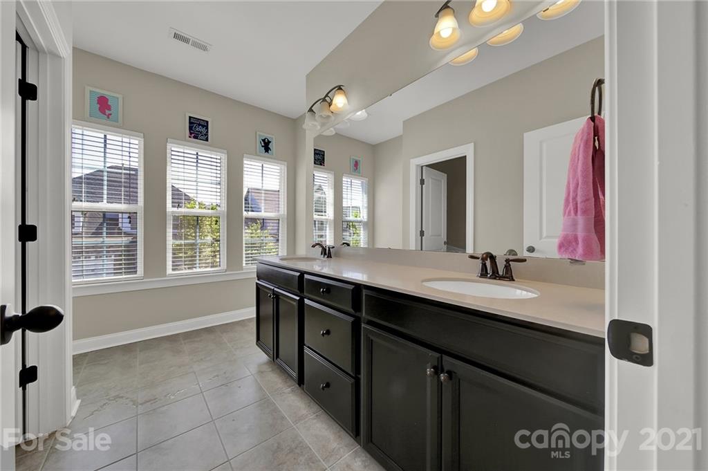 1033 Emory Lane Fort Mill, SC 29708 - Photo 26 of 48 a bathroom with a granite countertop sink mirror and double