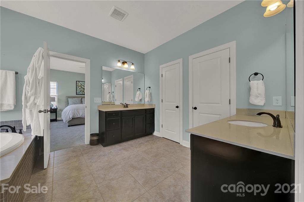1033 Emory Lane Fort Mill, SC 29708 - Photo 36 of 48 a en suite bathroom with a sink double vanity