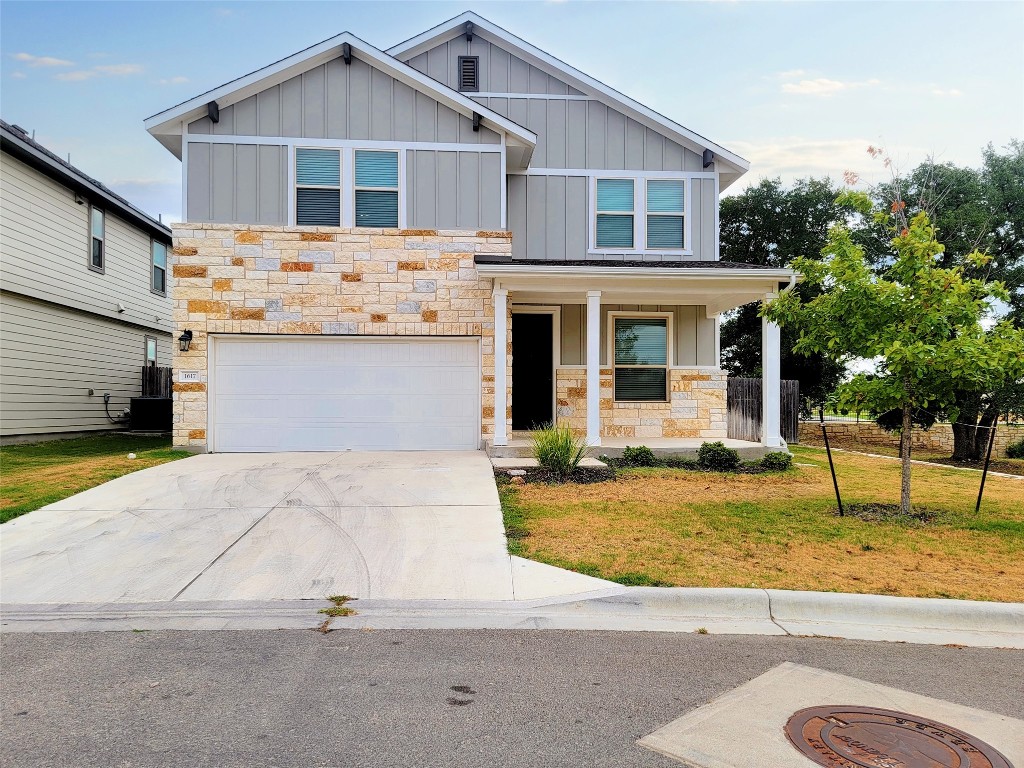 1617 Turtle Bay Loop Leander, TX 78641 - Photo 1 of 1 a front view of a house with a yard