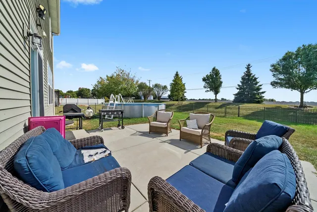 a front view of house with backyard and garden
