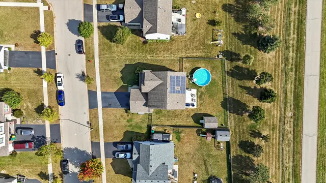 a bedroom with bed and a window