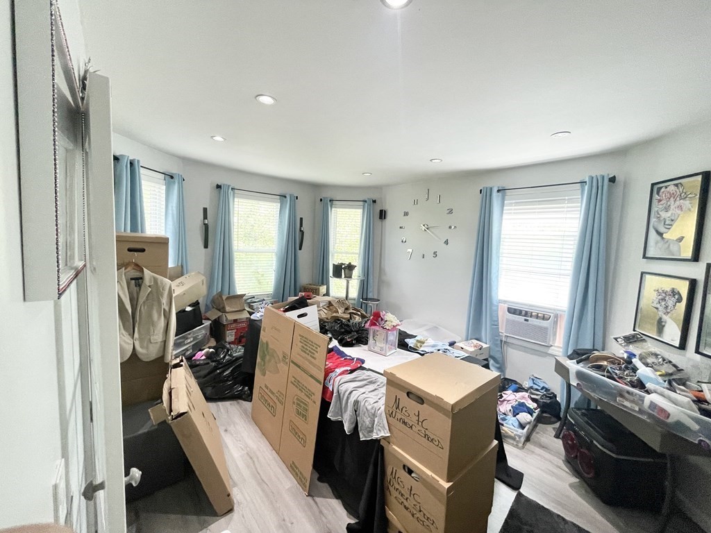 9 Mt Pleasant Avenue, Unit 3 Boston, MA 02119 - Photo 5 of 19 a bed room with furniture and a window