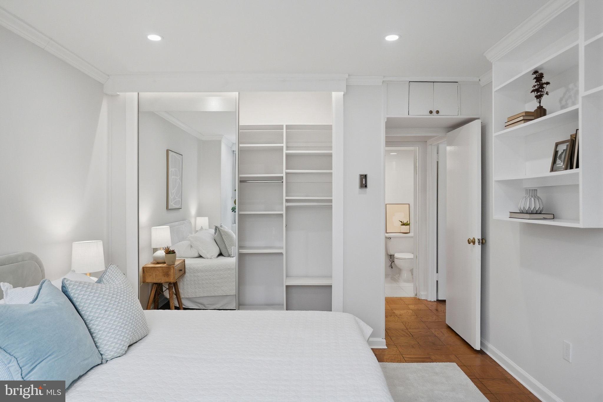 3001 Veazey Street Northwest, Unit 116 Washington, DC 20008 - Photo 20 of 40 a bed room with a bed and a refrigerator