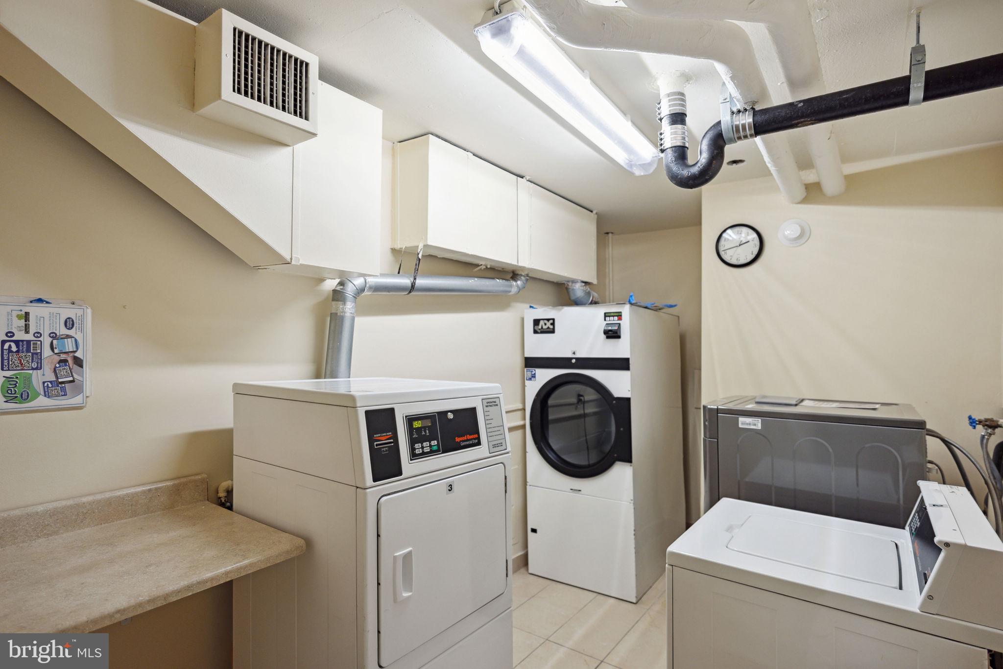 3001 Veazey Street Northwest, Unit 116 Washington, DC 20008 - Photo 25 of 40 a utility room with dryer and washer