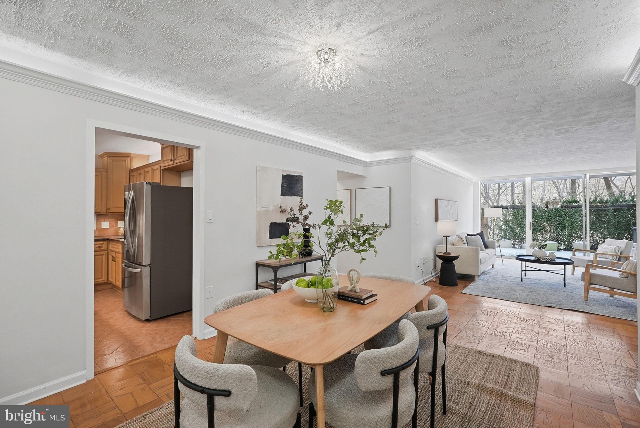 3001 Veazey Street Northwest, Unit 116 Washington, DC 20008 - Photo 8 of 40 a view of a dining room with furniture window and outside view