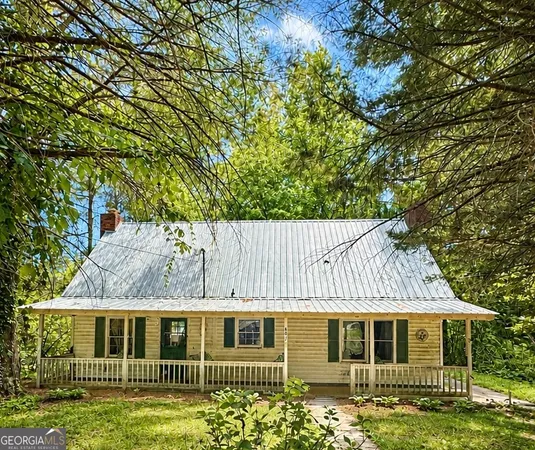 front view of a house with a garden