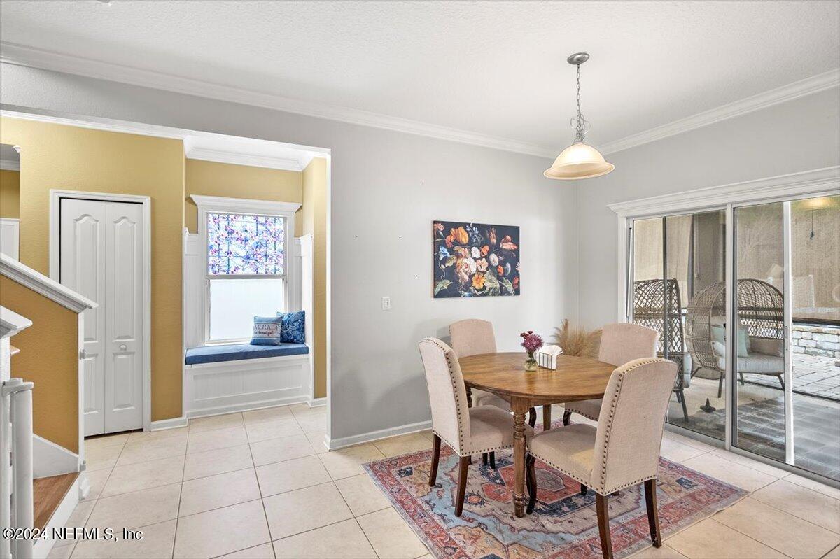 16402 Tisons Bluff Road Jacksonville, FL 32218 - Photo 15 of 45 a dining room with furniture and window