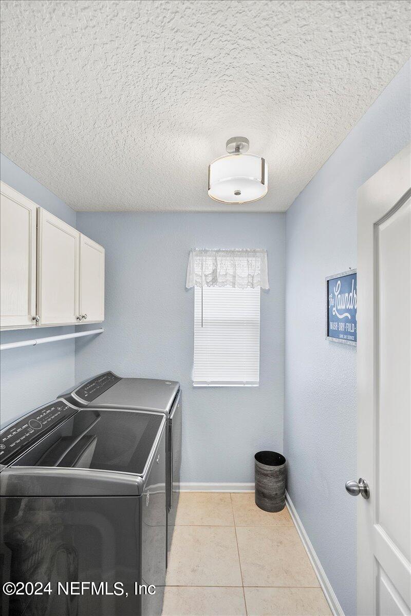 16402 Tisons Bluff Road Jacksonville, FL 32218 - Photo 20 of 45 a kitchen that has a sink and a stove top oven