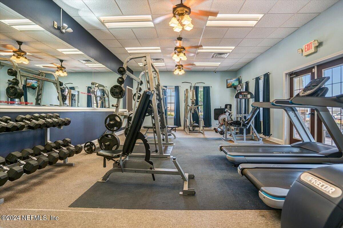 16402 Tisons Bluff Road Jacksonville, FL 32218 - Photo 36 of 45 a view of a room with gym equipment